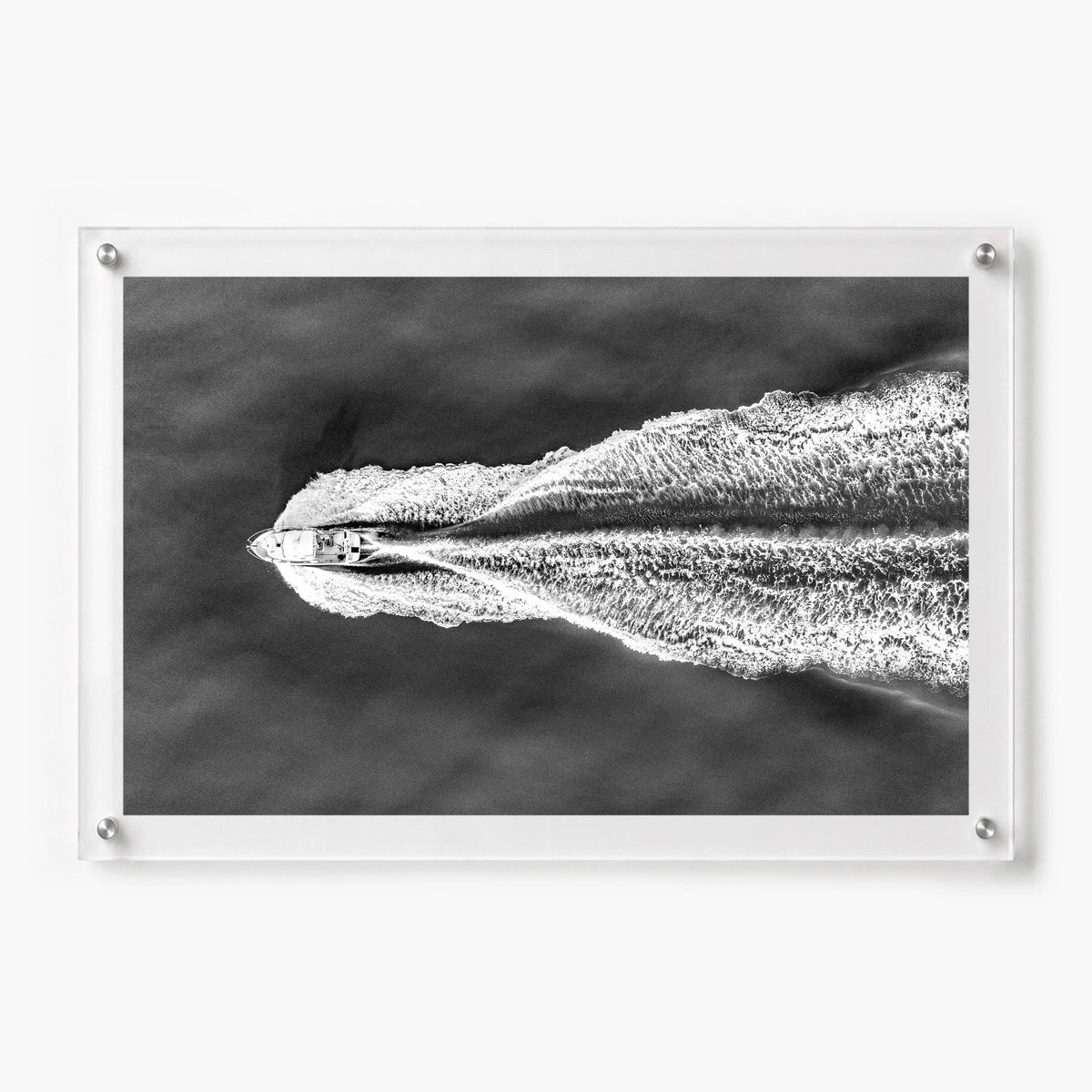 The Getaway acrylic wall art print with dramatic aerial boat scene