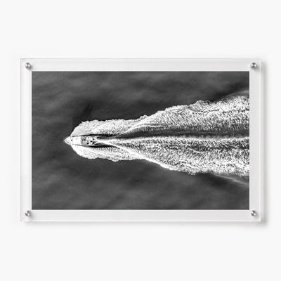 The Getaway acrylic wall art print with dramatic aerial boat scene