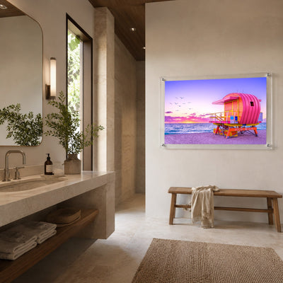 Pink lifeguard tower wall art with ocean and sandy beach