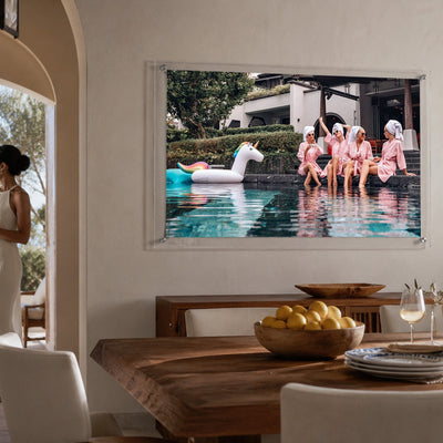 Resort inspired acrylic wall art with poolside friends in pink robes