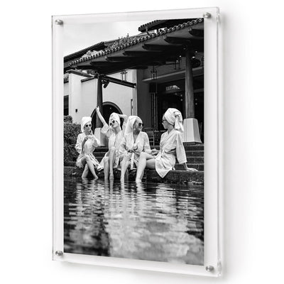 Breakfast at Brittany's black and white acrylic wall art featuring women relaxing by a pool