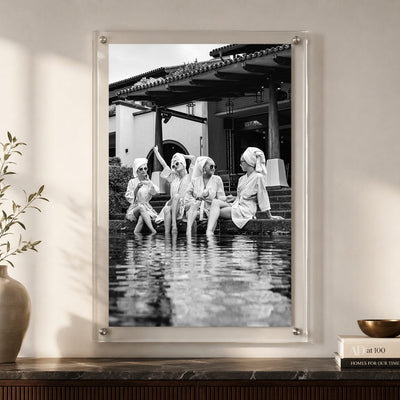 Black and white lifestyle wall art featuring friends in bathrobes