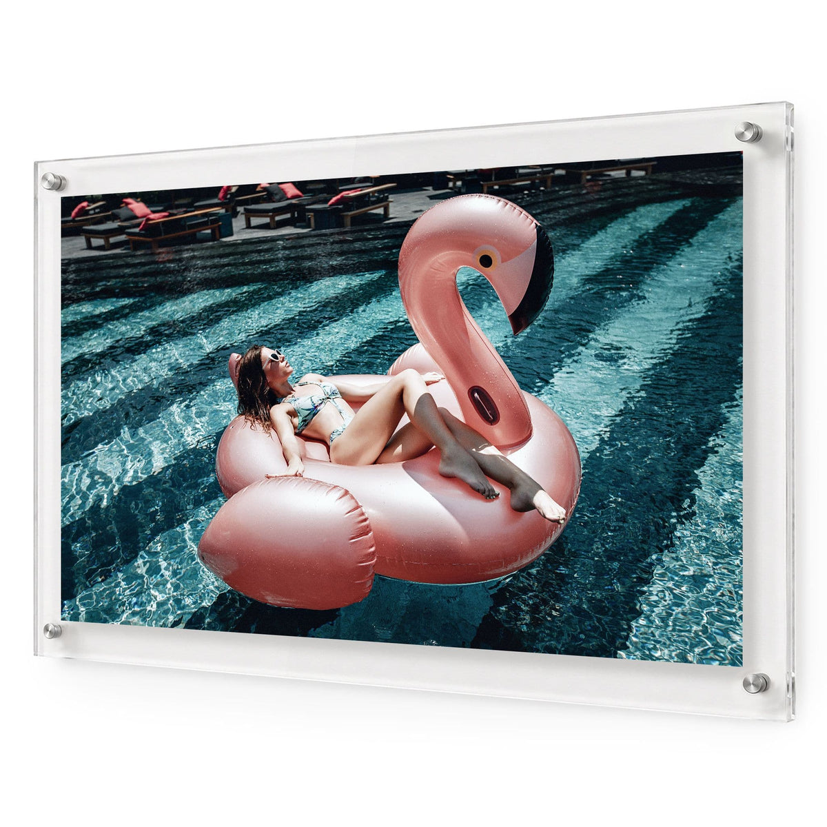 Framed pink flamingo pool wall art shown on a white background