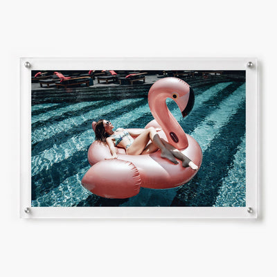 Framed pink flamingo pool wall art shown on a white background, 36x24 size