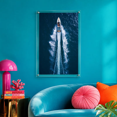 Exit By Sea wall art in a vibrant teal living room with sofa