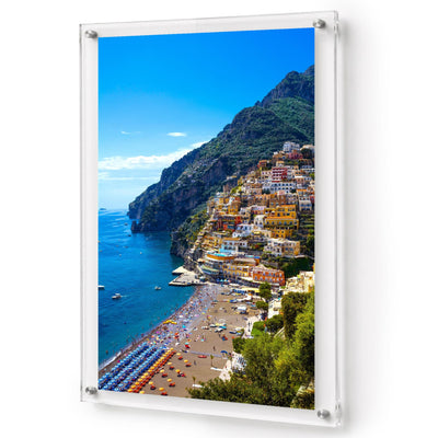 Positively Positano wall art shown in a vertical acrylic frame decor in white background