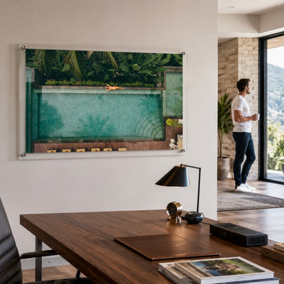 Palm and Circumstance wall art in a modern dining room space with man looking afar