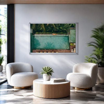 Palm and Circumstance wall art in a bright modern lounge space with plant on the table
