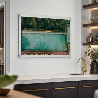 Palm and Circumstance wall art displayed above a modern kitchen wet bar