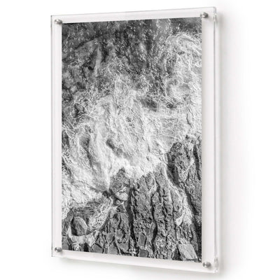 Foam and Fire wall art shown in a vertical acrylic frame product view