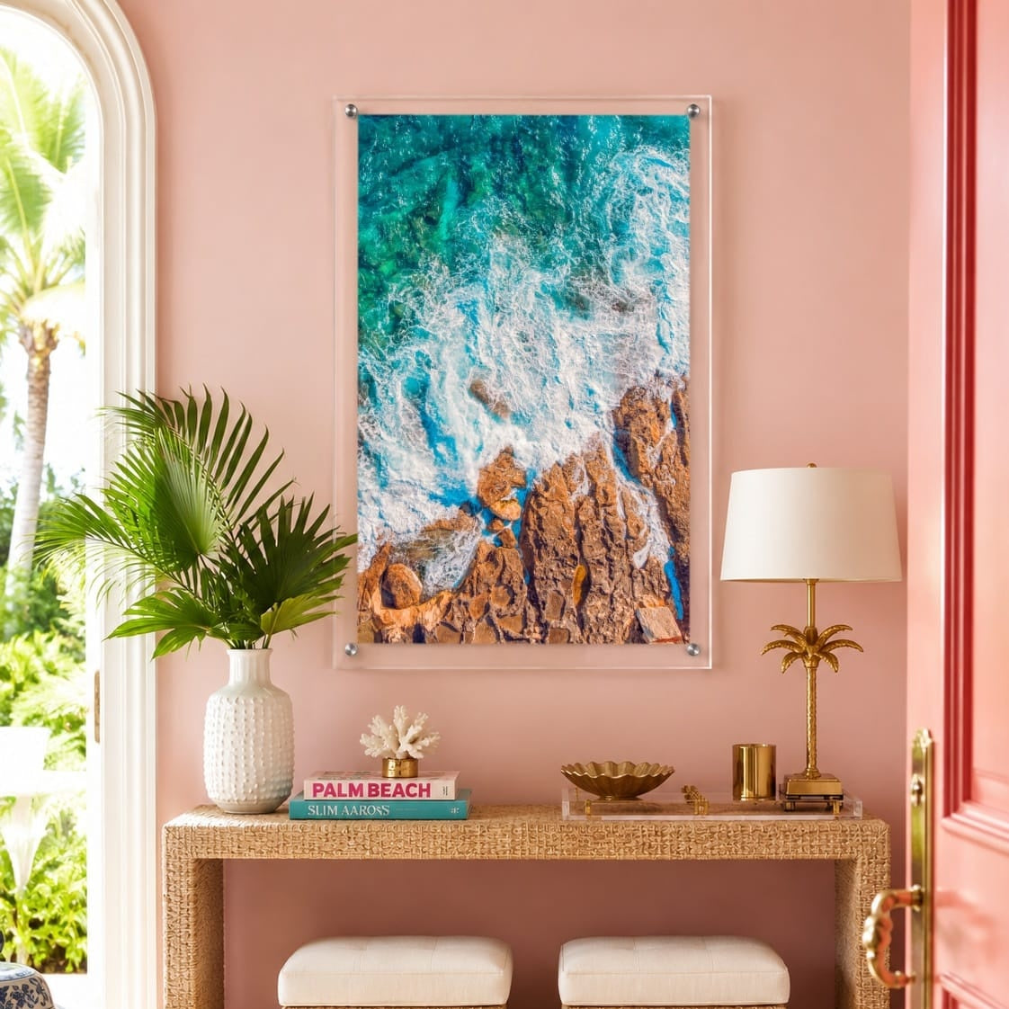 Foam and Fire wall art in a colorful pink entryway with console