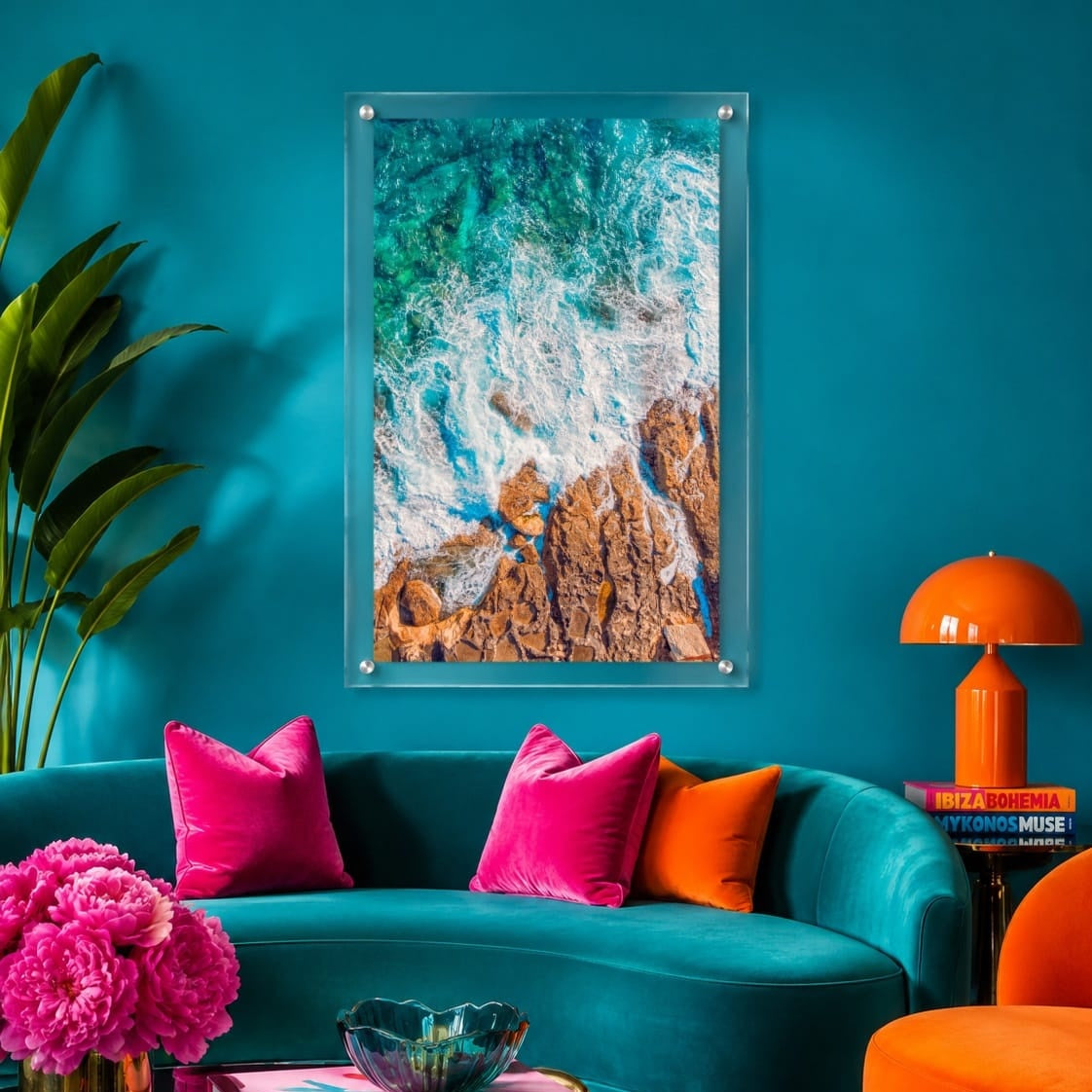 Foam and Fire wall art in a vibrant teal lounge with sofa decor