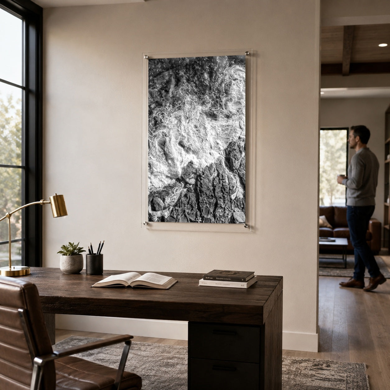 Foam and Fire wall art in a modern home office with a desk with man
