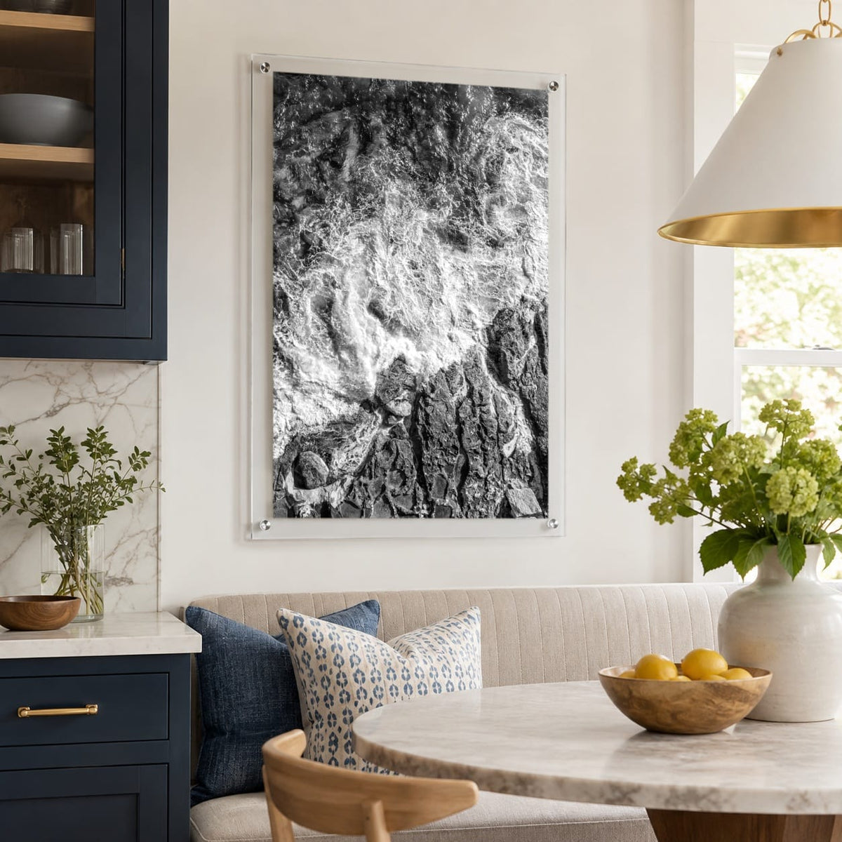 Foam and Fire wall art in a stylish navy kitchen breakfast nook with sunlight