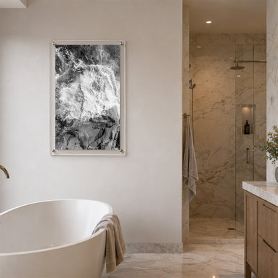 Modern coastal wall art displayed in a bathroom