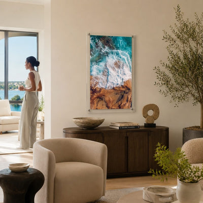 Colorful coastal wall decor featuring crashing waves and rocks