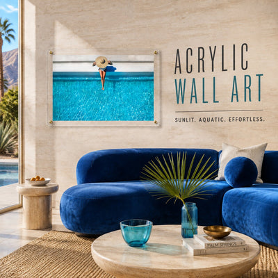 The Temperature Check wall art above a blue velvet sofa in a lounge space