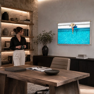 The Temperature Check wall art in a rustic living space setting with woman standing