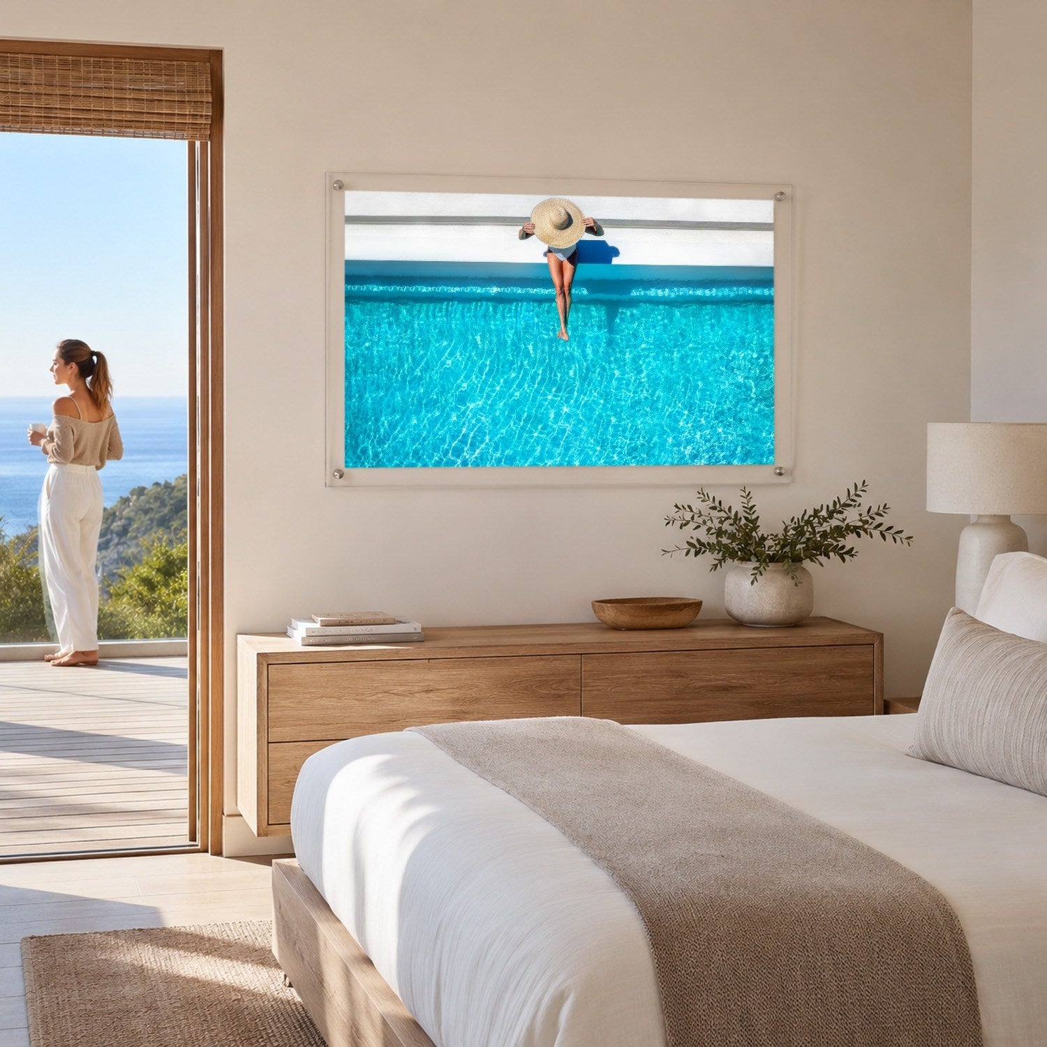 The Temperature Check wall art above a bed in a bright bedroom space with woman standing afar