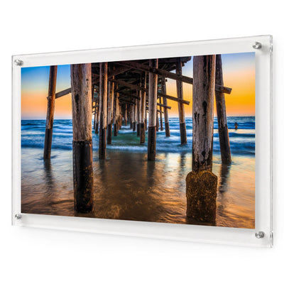 Pier Pressure color acrylic wall art shown in a 36x24-inch size, framed with white background