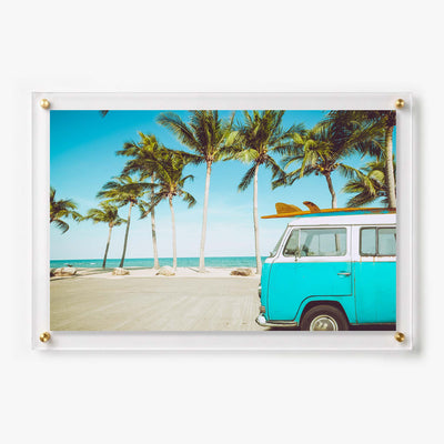 Acrylic wall art featuring a turquoise vintage van 