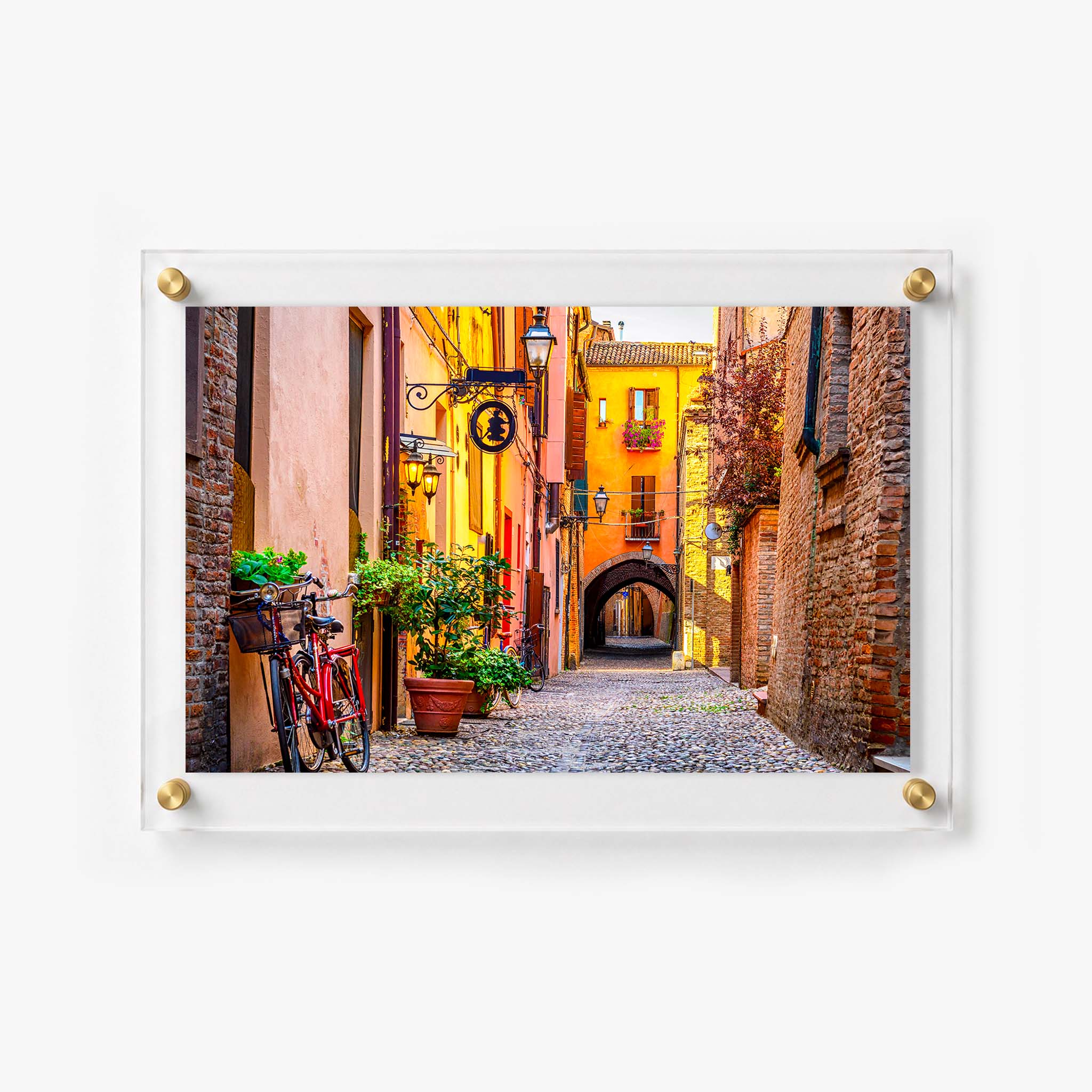 Acrylic wall art of a quiet Italian lane lined with bicycles, lanterns, and rustic brick walls