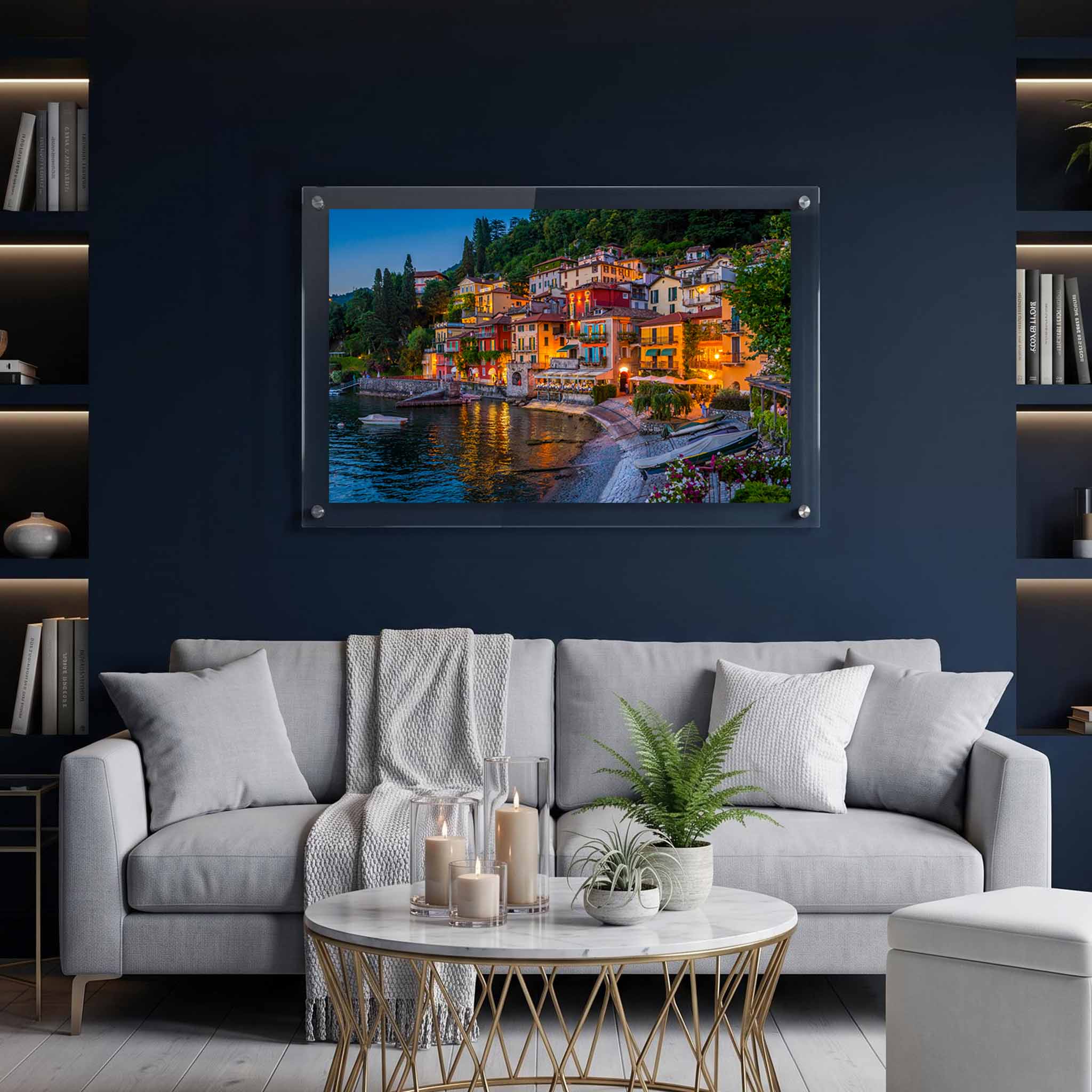 Colorful Italian lakeside village wall art displayed in a living room