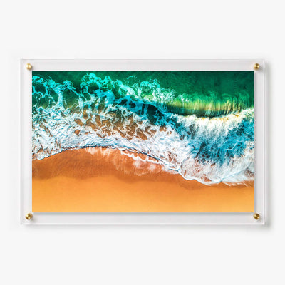 Acrylic wall art featuring turquoise ocean waves 