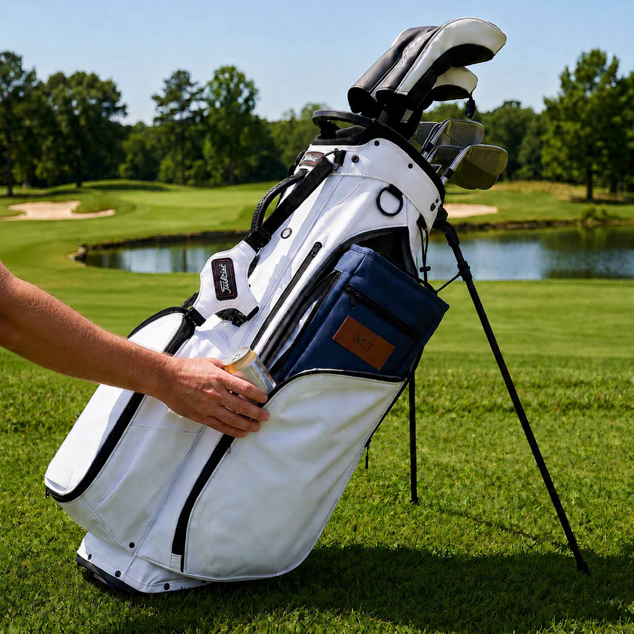 hands putting drinks inside the custom golf insulated bag cooler 