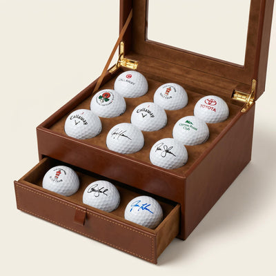 Luxury golf ball collector box filled with signed, branded, and course logo golf balls