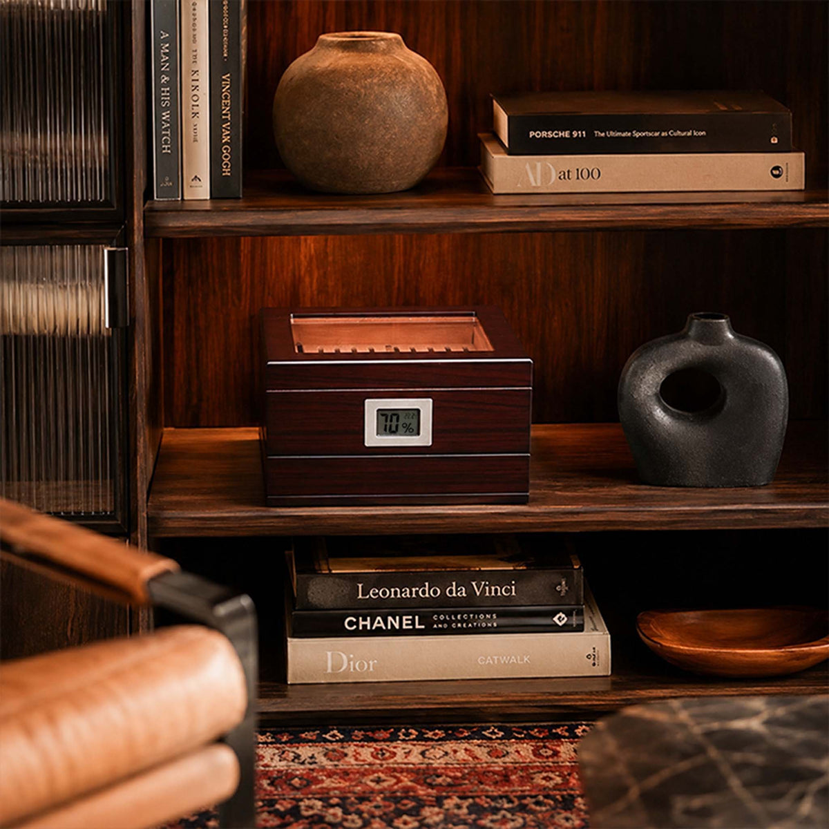 wooden cigar humidor with digital hygrometer displayed on shelf