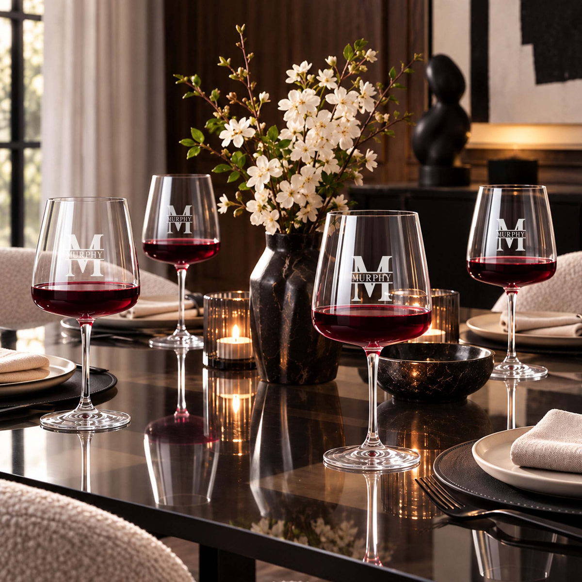 personalized red wine glasses on elegant dining table