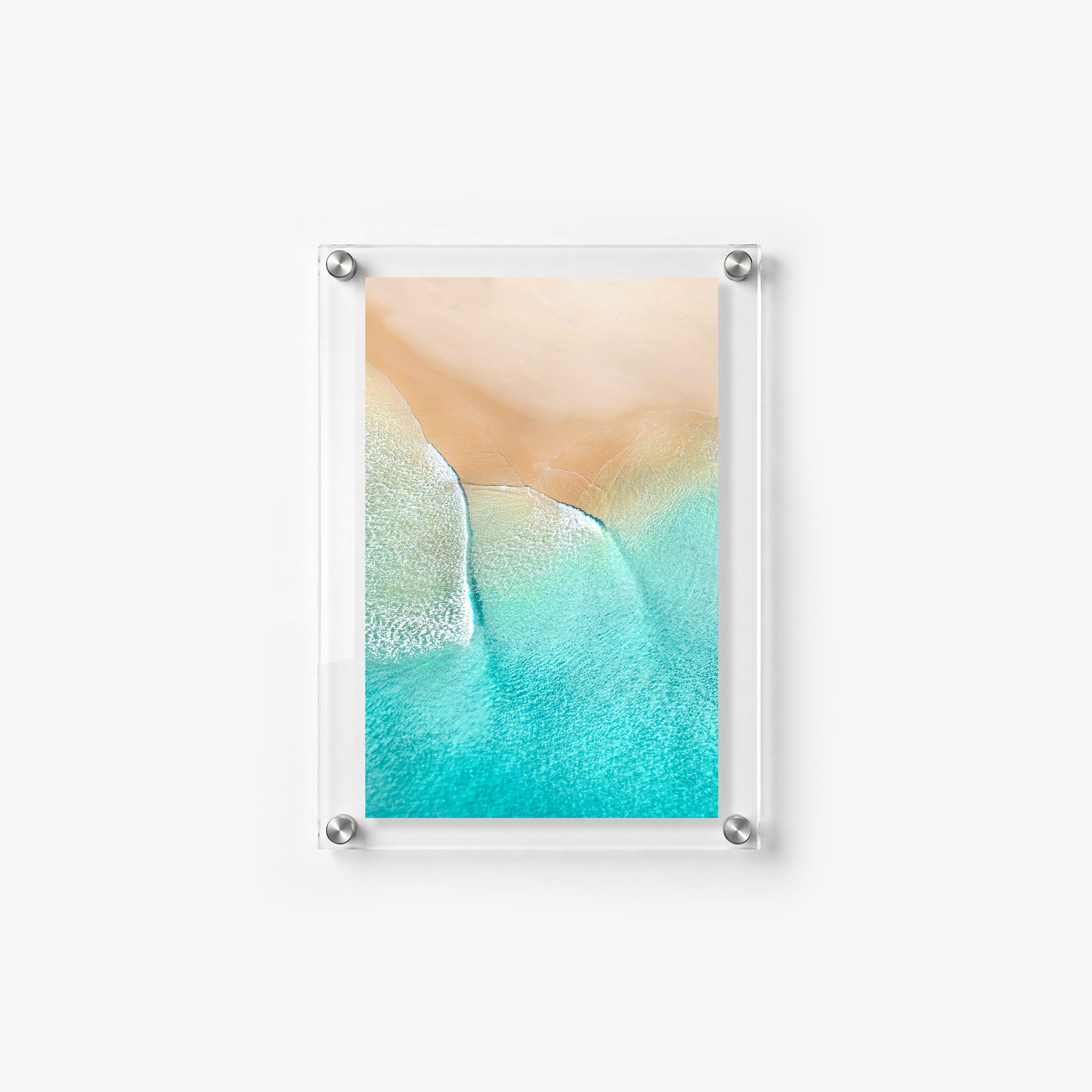 Tropical acrylic wall art print featuring vivid turquoise water 