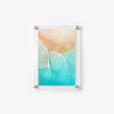 Tropical acrylic wall art print featuring vivid turquoise water 