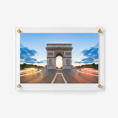 Paris wall art showing the Arc de Triomphe surrounded by red and golden light trails