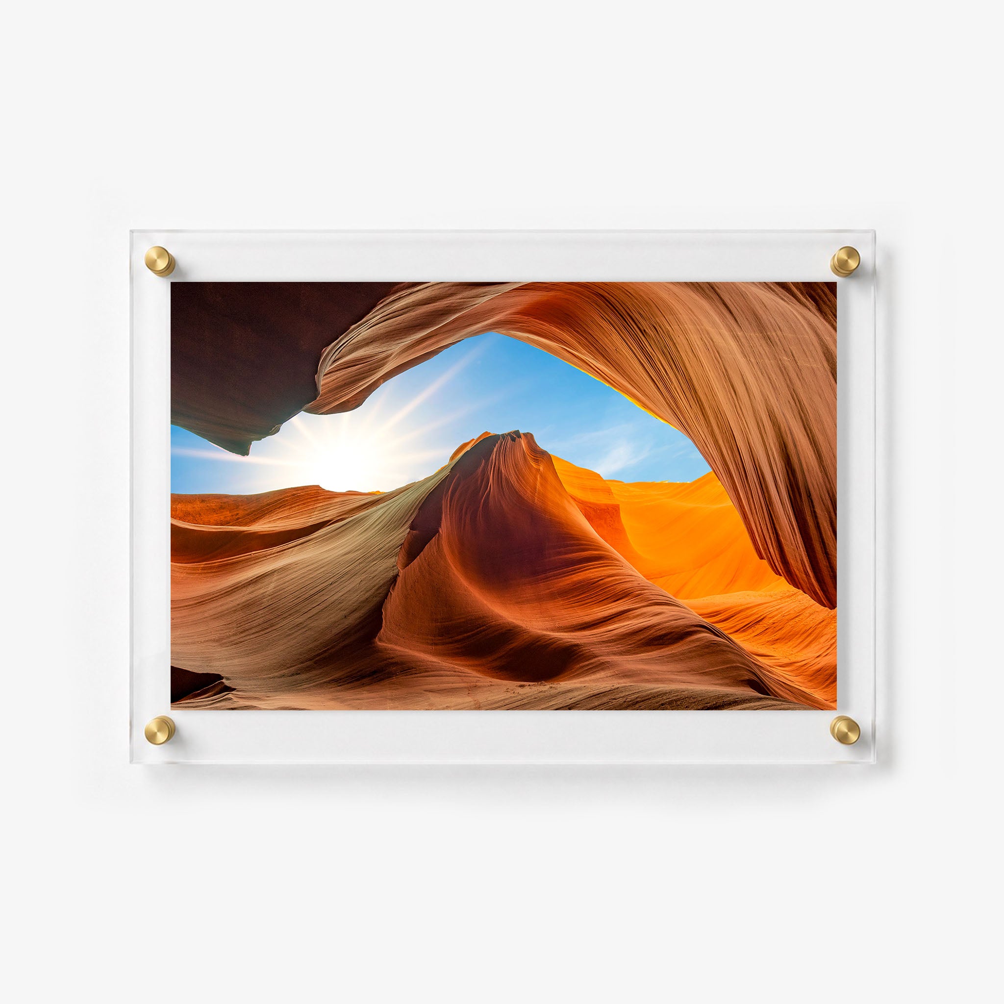Scenic desert wall art featuring sculpted sandstone curves and a sunlit opening