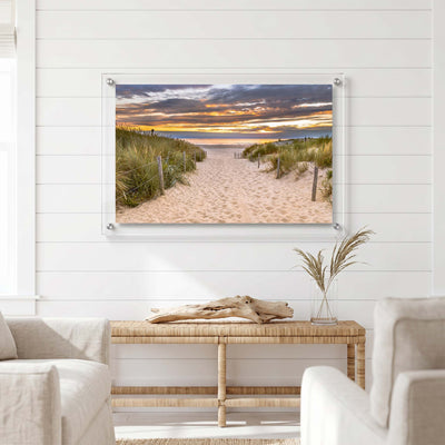 Coastal acrylic wall art print displayed in a bright living room
