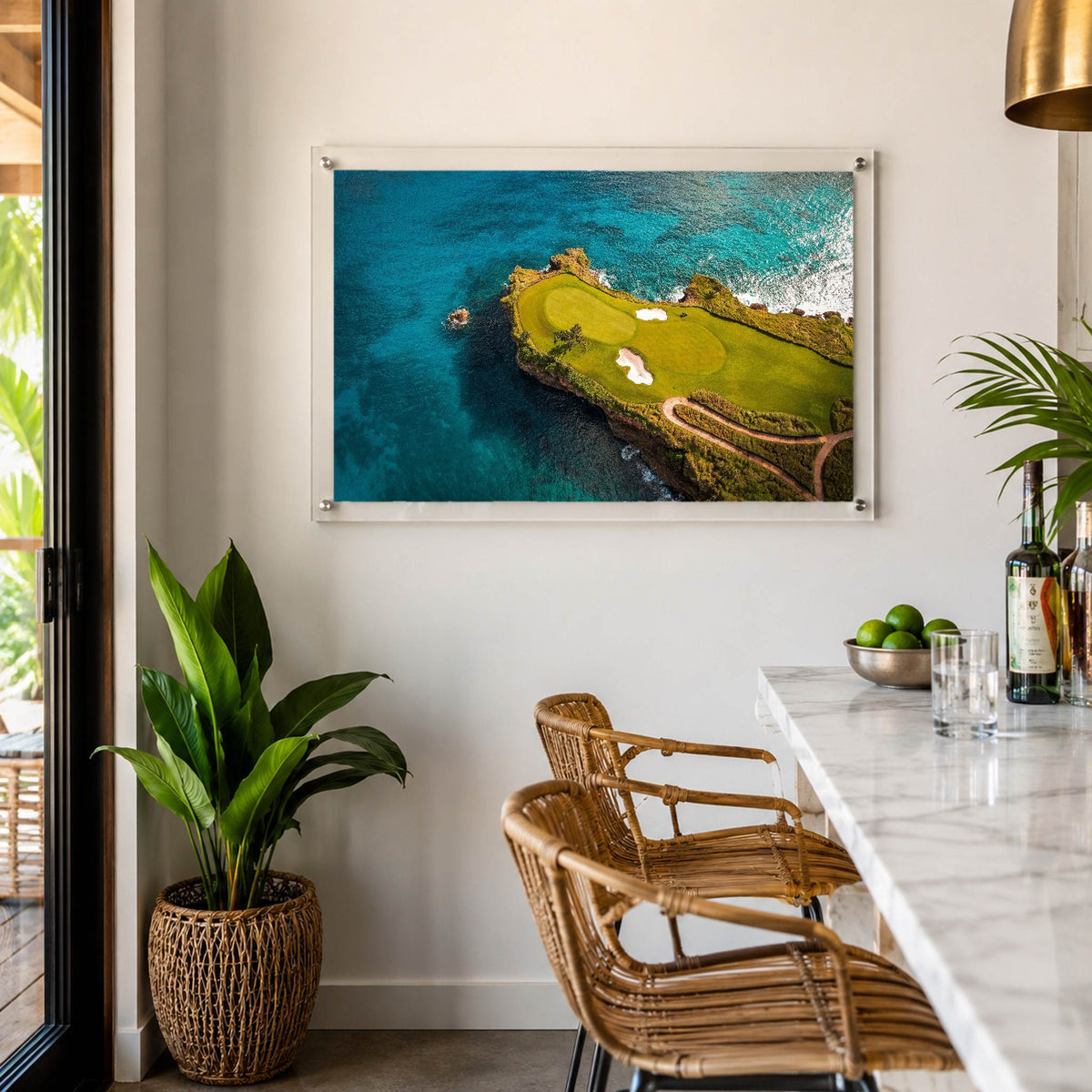 Aerial golf course wall art overlooking bright blue water