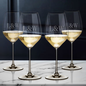 Four White Riedel Glasses