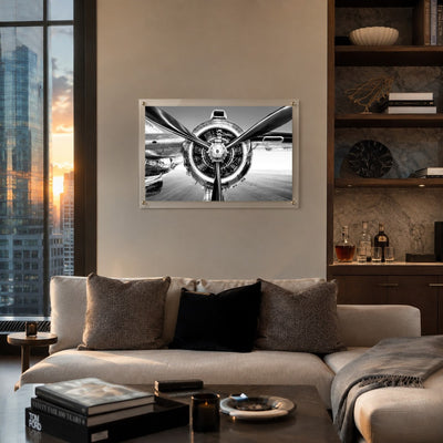 Prop Culture wall art hung above a sofa inside a high rise apartment