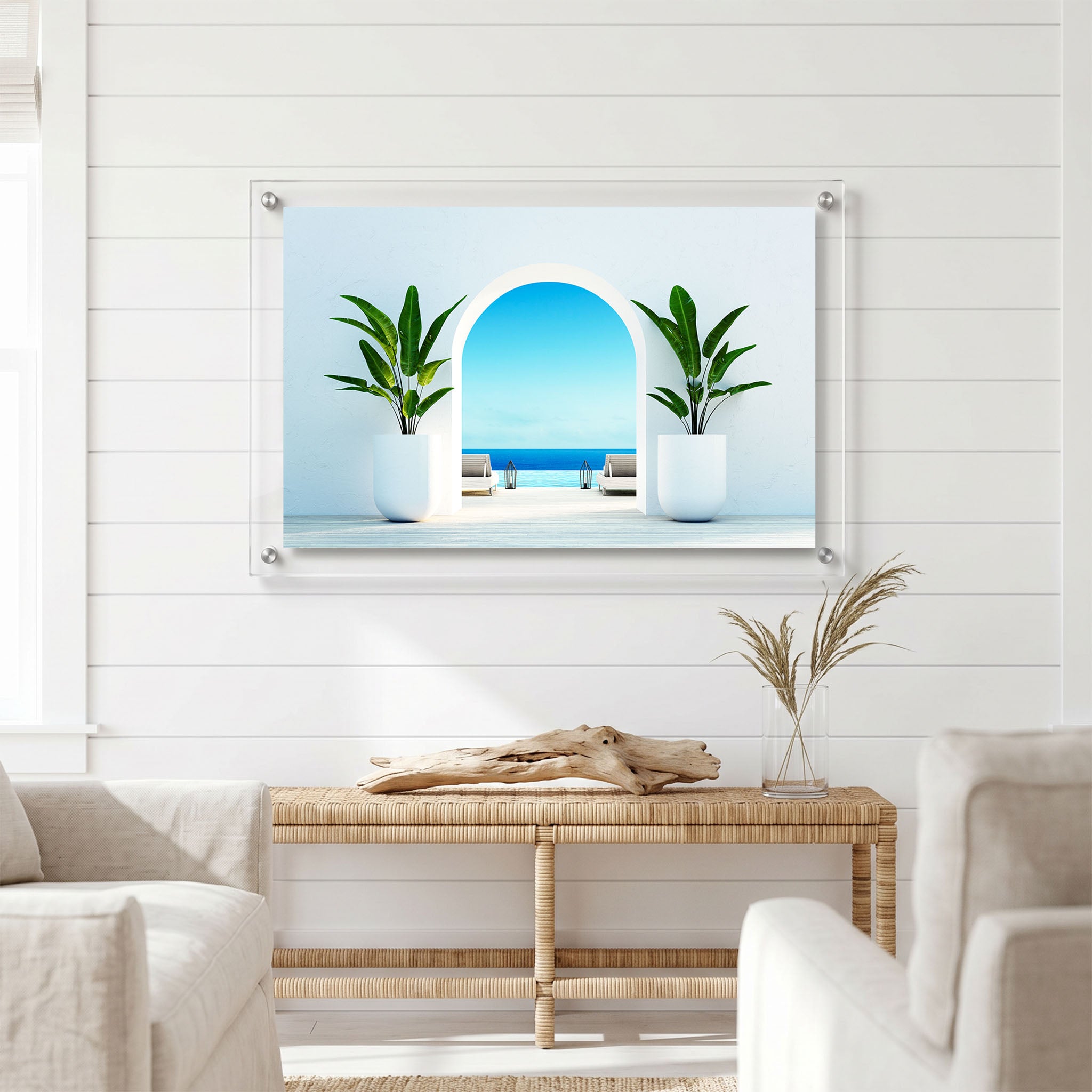Serene resort scene wall art displayed in a bright living room