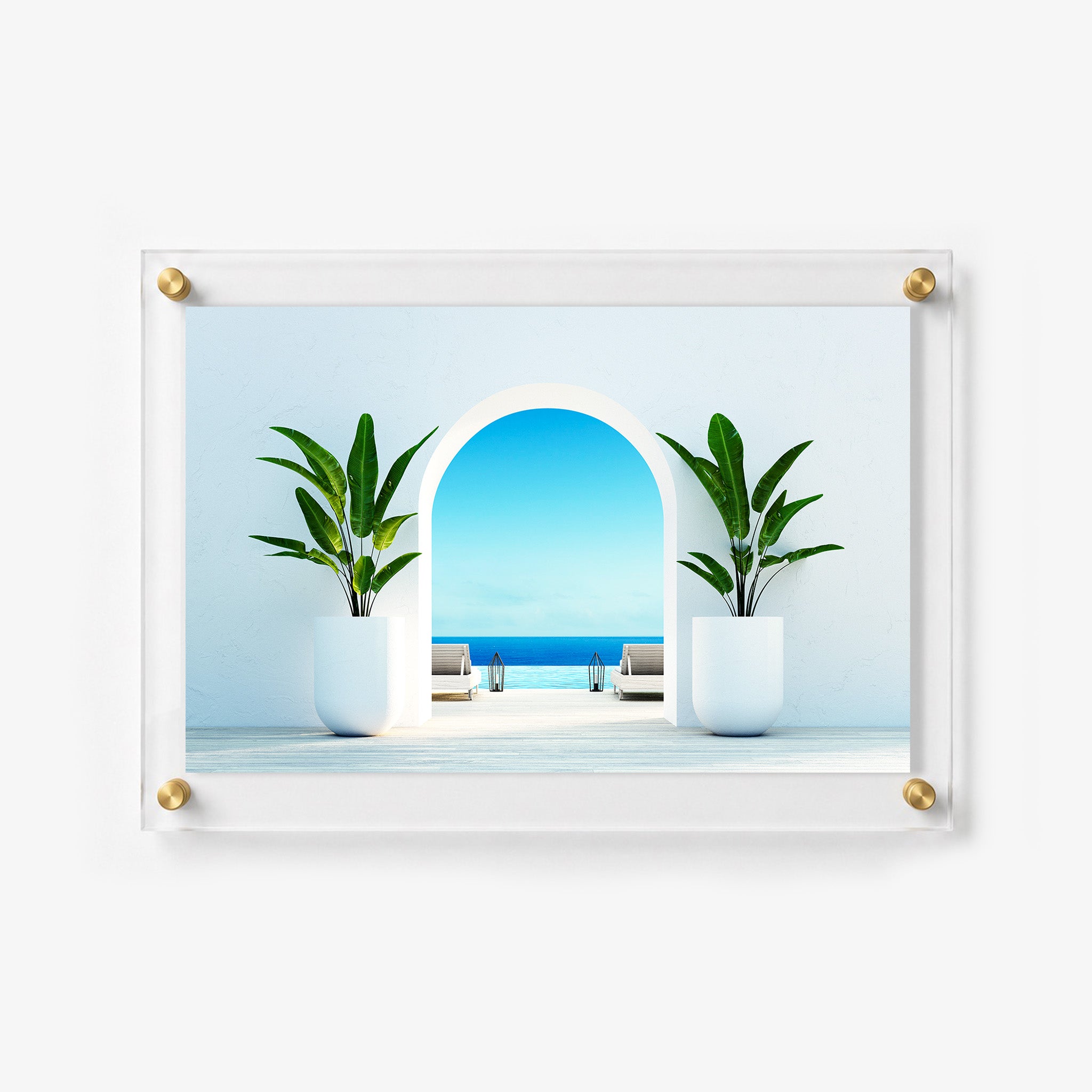Horizontal acrylic print featuring an arched doorway opening toward an infinity pool and the ocean