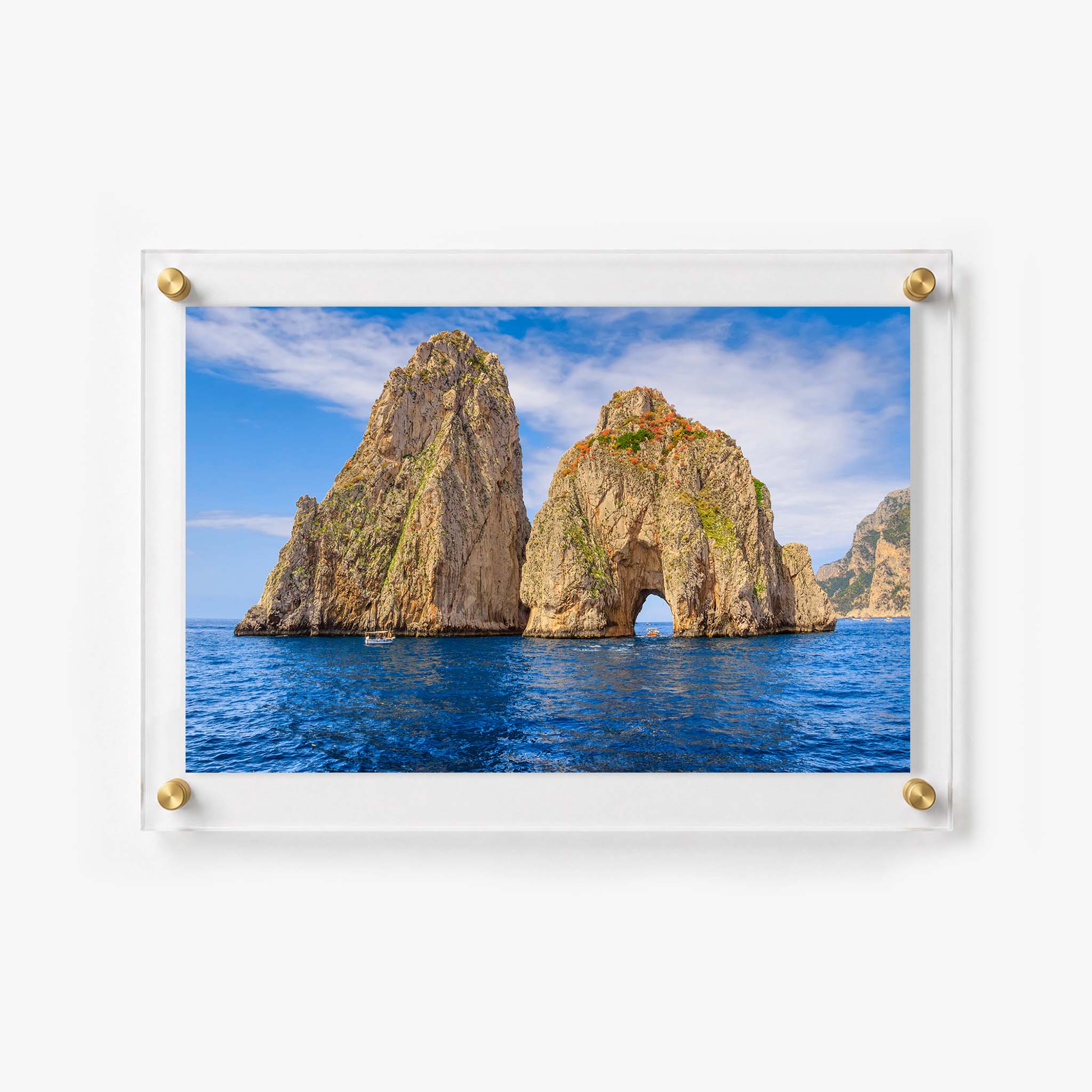 Dramatic coastal rock formations with a natural arch