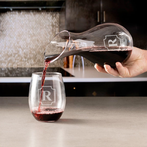 custom engraved reims slant decanter pouring red wine into a glass