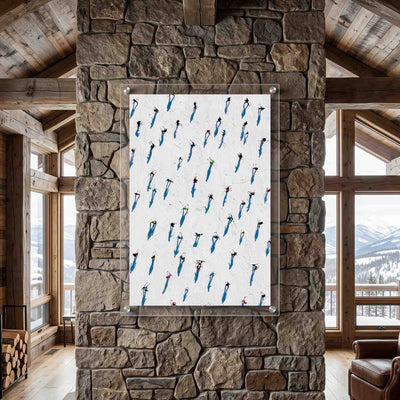 Modern acrylic wall art featuring skiers displayed in a mountain cabin