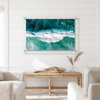 Powerful ocean waves displayed in a bright living room