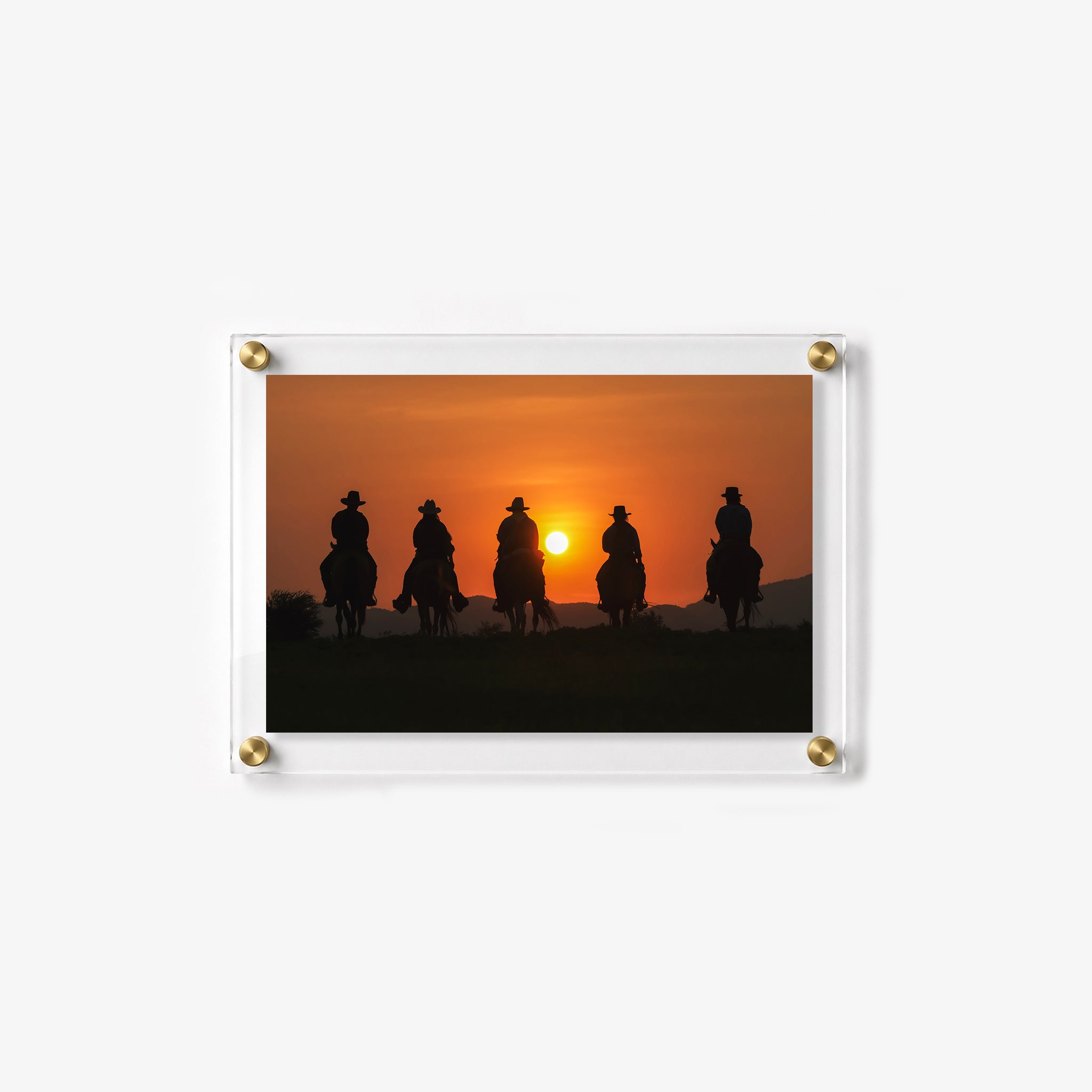 Rustic wall art showing a group of horseback riders