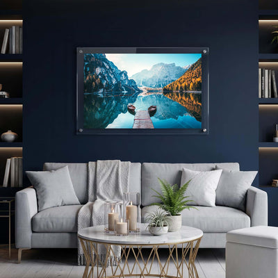 Mountain lake wall art displayed in an elegant living room