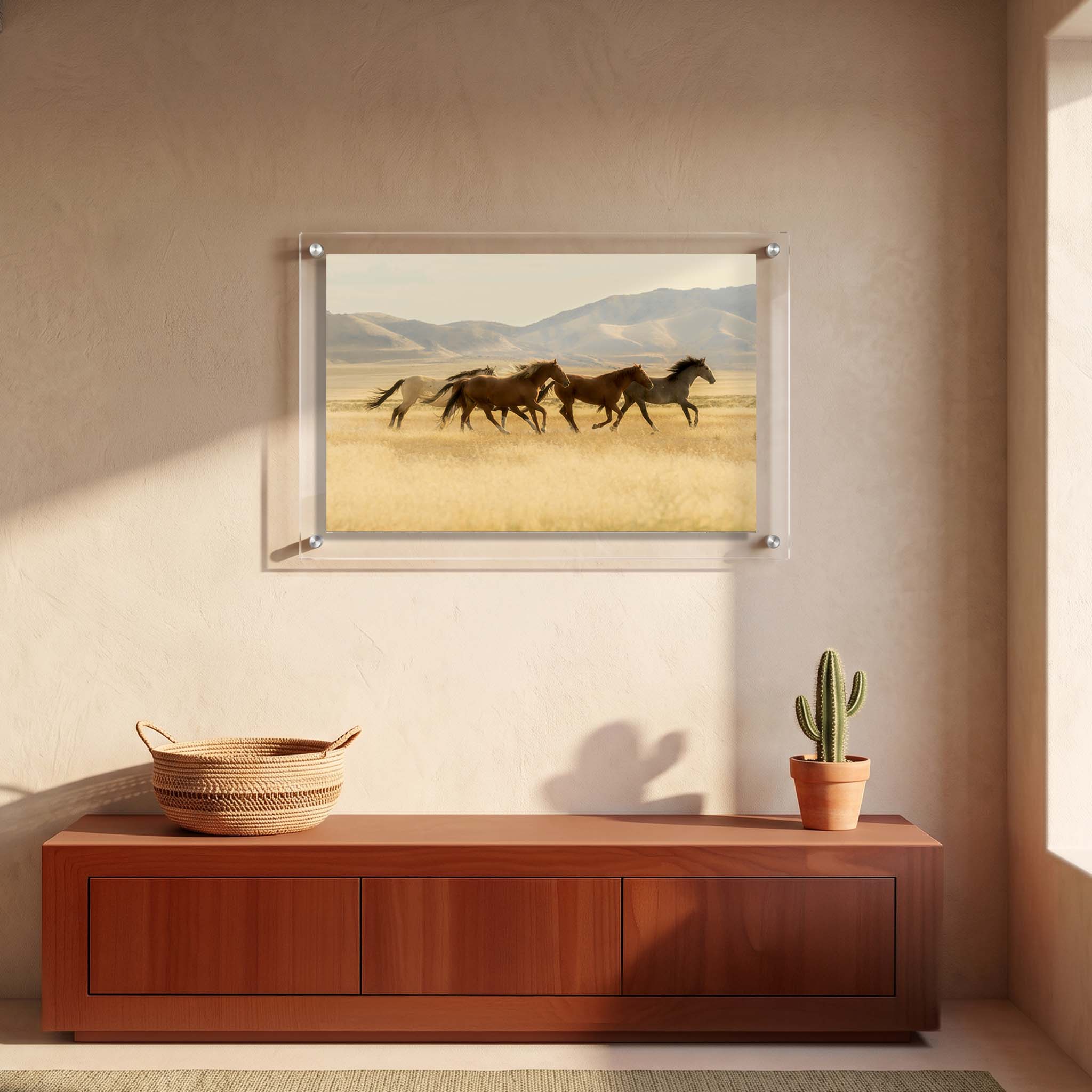 Rustic acrylic wall art of wild horses displayed in an entryway