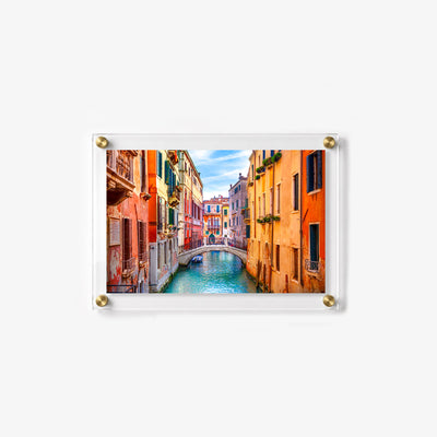 Horizontal acrylic print featuring colorful waterfront buildings and a narrow canal in Venice